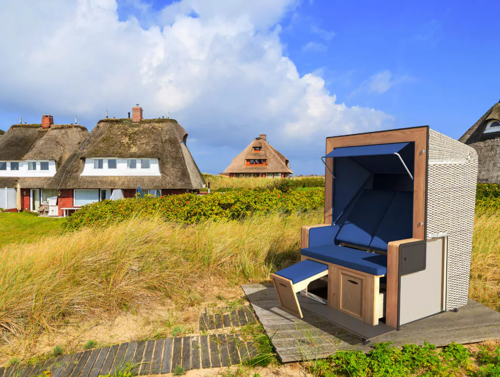Beach Chair On Sand Dune And Typical Cottages In List Village, Sylt Island, Germany